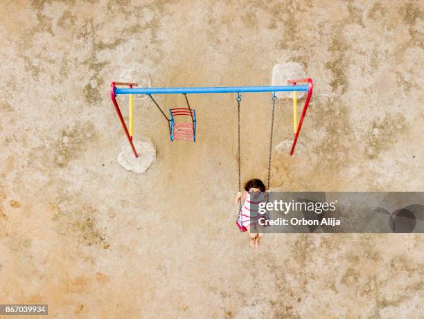 children playing in the park - aerial view of childs playground stock pictures, royalty-free photos & images