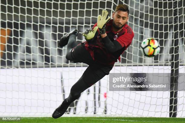 Gianluigi Donnarumma of AC Milan in action before the Serie A match between AC Chievo Verona and AC Milan at Stadio Marc'Antonio Bentegodi on October...