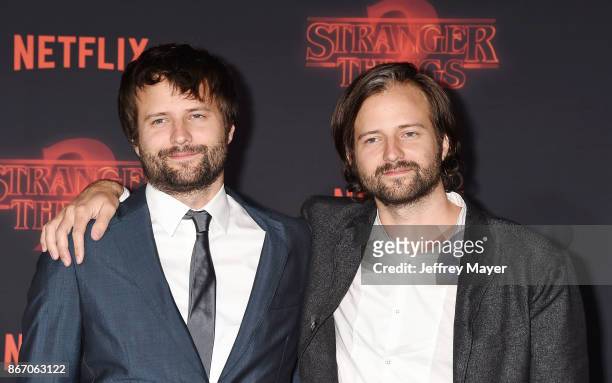 Co-creators/executive producers Ross Duffer and Matt Duffer arrive at the Premiere Of Netflix's 'Stranger Things' Season 2 at Regency Westwood...