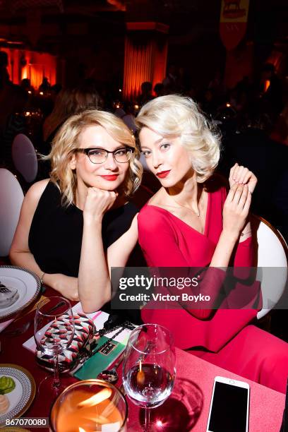 Evelina Khromtchenko and Anastassia Khozissova attend TSUM 110th Anniversary Celebration Party on October 26, 2017 in Moscow, Russia.