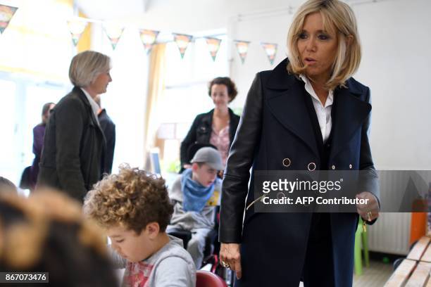 Brigitte Macron , the wife of the French president, visits the "Loisir pluriel" centre for both able-bodied and disabled children in Nantes on...