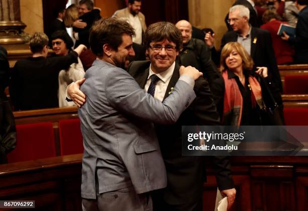 Catalan regional President Carles Puigdemont celebrates after Catalonian Parliament declared independence following the secret ballot at Catalonian...