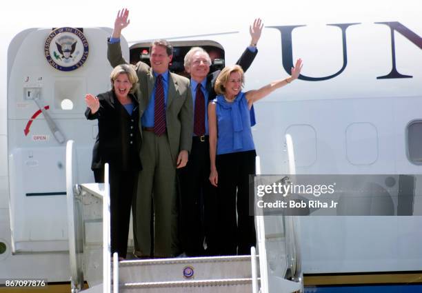 Presidential candidate Al Gore and wife Tipper are joined by Vice-Presidential candidate Joe Lieberman and wife Hadassah as they wave to the crowd...