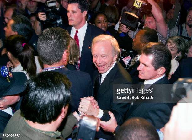 Vice Presidential candidate Joe Lieberman moves through the crowd as he makes a surprise appearance while walking through the floor of the Staples...