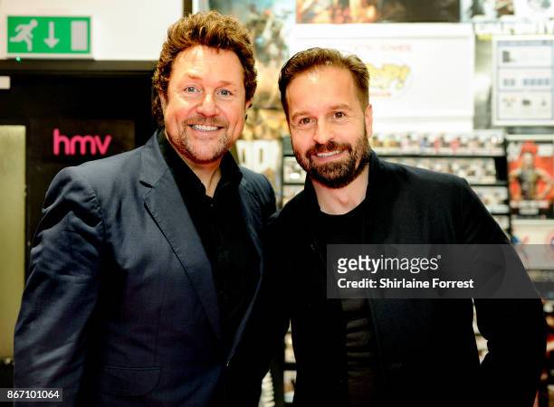 Michael Ball and Alfie Boe sign copies of their new album 'Together Again' at HMV Manchester on October 27, 2017 in Manchester, England.To celebrate...