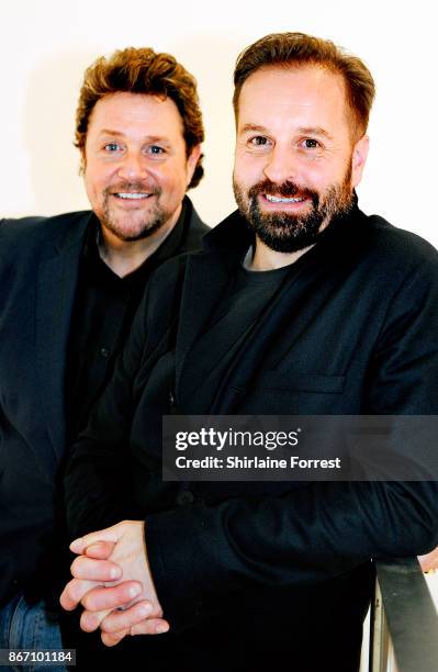 Michael Ball and Alfie Boe pose backstage after signing copies of their new album 'Together Again' at HMV Manchester on October 27, 2017 in...