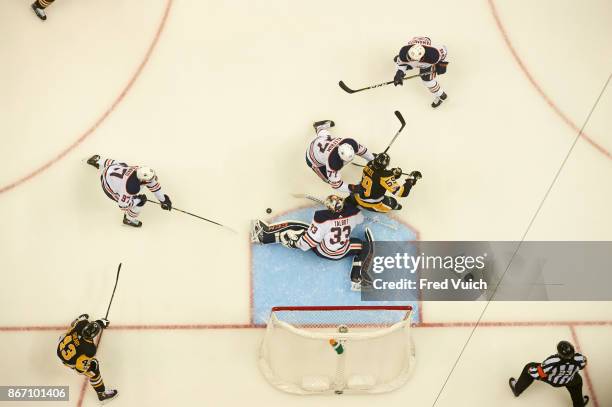Aerial view of Edmonton Oilers goalie Cam Talbot , Connor McDavid and Oscar Klefbom in action vs Pittsburgh Penguins Jake Guentzel at PPG Paints...