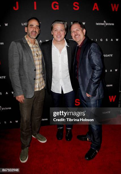 Pete Goldfinger, Oren Koules and Josh Stolberg attend the premiere of Lionsgate's 'Jigsaw' at ArcLight Hollywood on October 25, 2017 in Hollywood,...