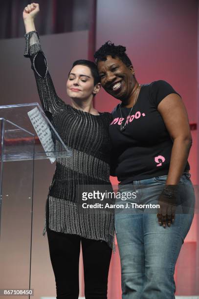 Actress Rose McGowan and Tarana Burke on stage at The Women's Convention at Cobo Center on October 27, 2017 in Detroit, Michigan.