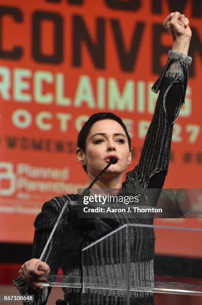 Actress Rose McGowan speaks on stage at The Women's Convention at Cobo Center on October 27, 2017 in Detroit, Michigan.