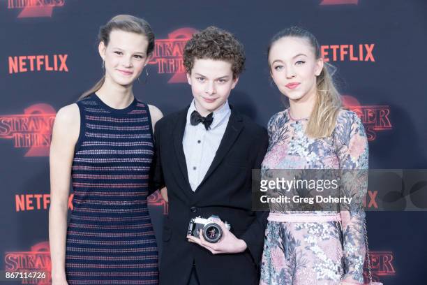 Actors Peyton Kennedy, Quinn Liebling, and Sydney Sweeney attend the Premiere Of Netflix's "Stranger Things" Season 2 at the Regency Bruin Theatre on...
