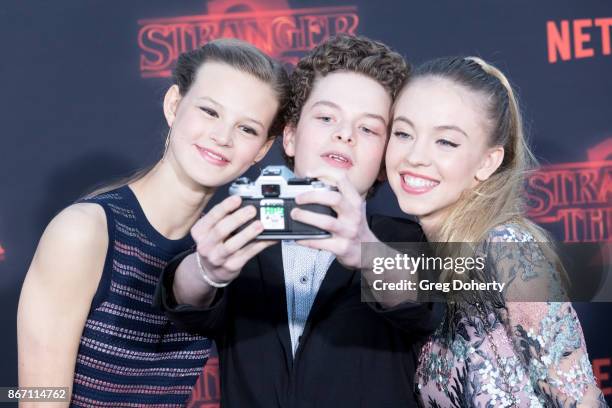 Actors Peyton Kennedy, Quinn Liebling, and Sydney Sweeney attend the Premiere Of Netflix's "Stranger Things" Season 2 at the Regency Bruin Theatre on...