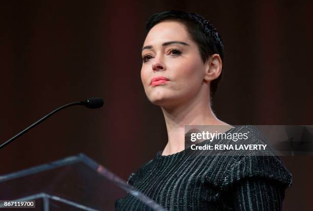 Actress Rose McGowan gives opening remarks to the audience at the Women's March / Women's Convention in Detroit, Michigan, on October 27, 2017. - A...