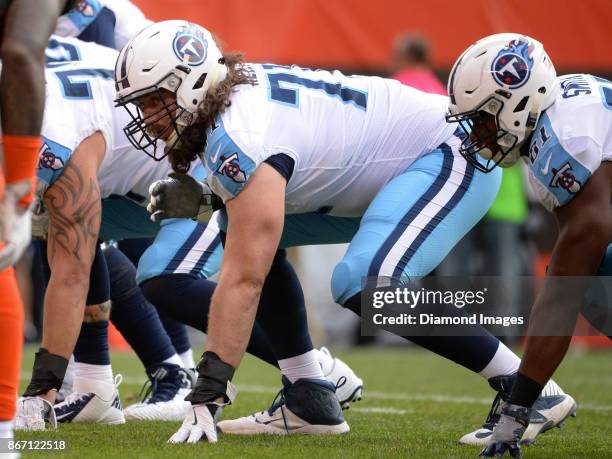 Tackle Dennis Kelly of the Tennessee Titans awaits the snap from his position in the third quarter of a game on October 22, 2017 against the...