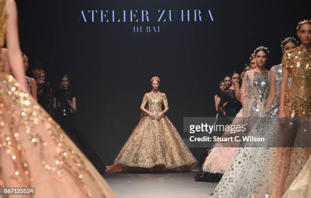 Model walks the runway during the Atelier Zuhra show at Fashion Forward October 2017 held at the Dubai Design District on October 27, 2017 in Dubai,...