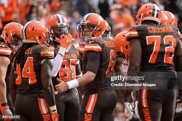 Quarterback Cody Kessler of the Cleveland Browns gestures toward an official as he stands in the huddle in the third quarter of a game on October 22,...