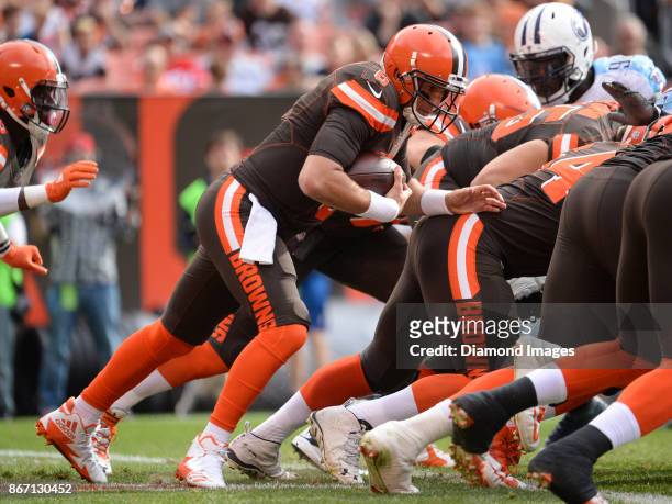 Quarterback Cody Kessler of the Cleveland Browns carries the ball on a quarterback sneak in the third quarter of a game on October 22, 2017 against...