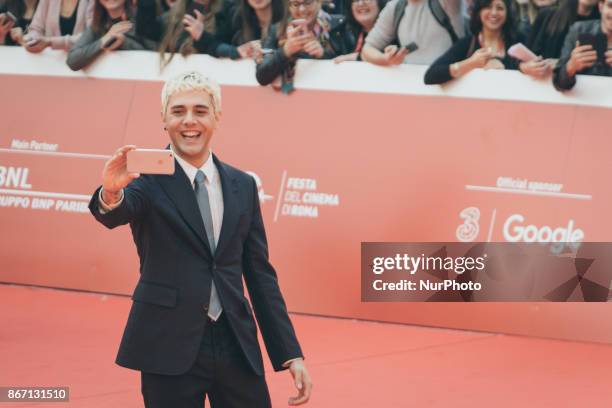 Xavier Dolan walks a red carpet during the 12th Rome Film Fest at Auditorium Parco Della Musica on October 27, 2017 in Rome, Italy.