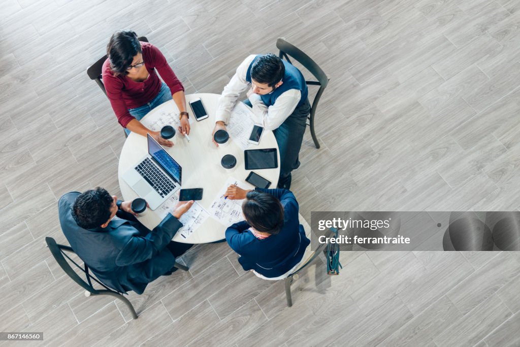 Business meeting seen from above