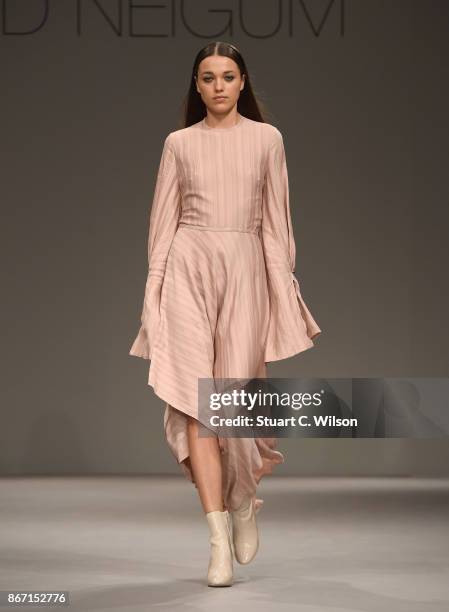 Model walks the runway during the Sid Neigum International show at Fashion Forward October 2017 held at the Dubai Design District on October 27, 2017...