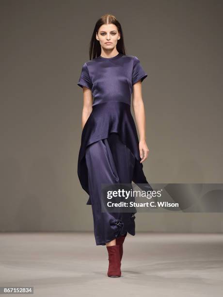 Model walks the runway during the Sid Neigum International show at Fashion Forward October 2017 held at the Dubai Design District on October 27, 2017...