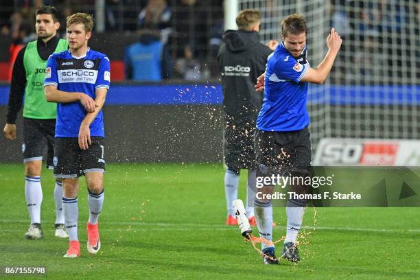 Florian Dick, Patrick Weihrauch and Julian Boerner of Bielefeld react after losing the Second Bundesliga match between DSC Arminia Bielefeld and FC...