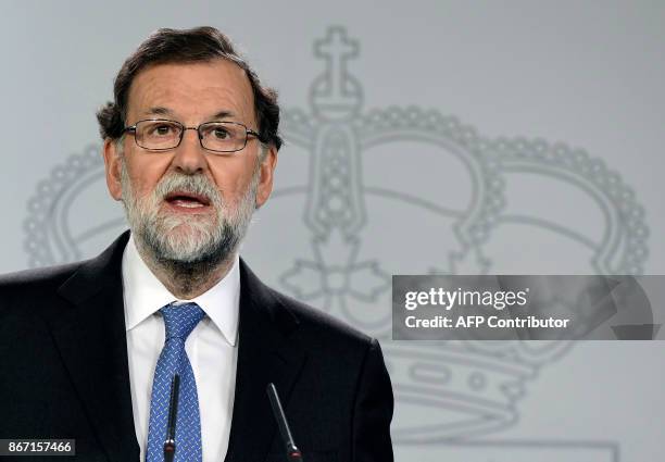 Spanish Prime Minister Mariano Rajoy gives a press conference after a cabinet meeting at La Moncloa Palace in Madrid, on October 27, 2017. Spanish...