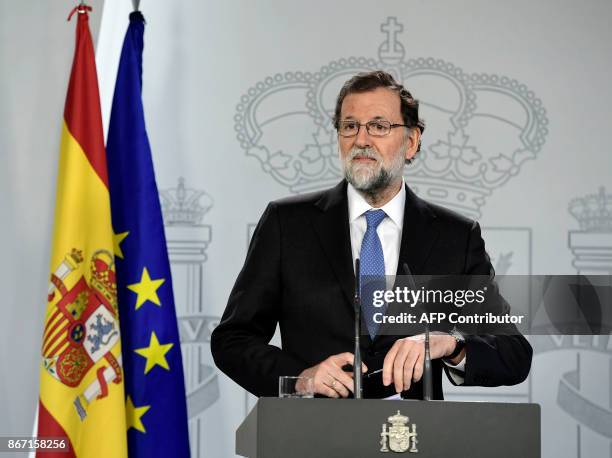 Spanish Prime Minister Mariano Rajoy gives a press conference after a cabinet meeting at La Moncloa Palace in Madrid, on October 27, 2017. Spanish...