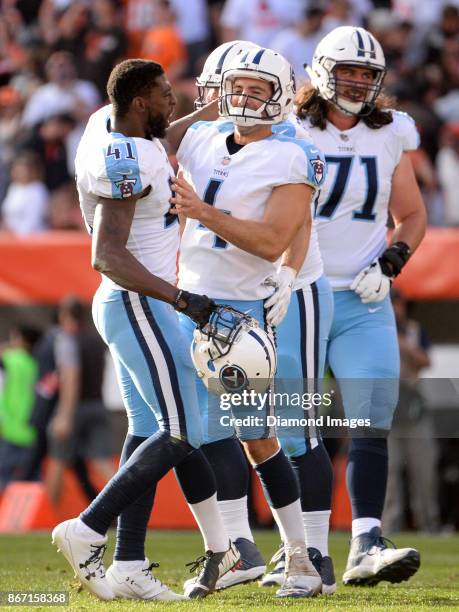 Kicker Ryan Succop and safety Brynden Trawick of the Tennessee Titans celebrate the game winning field goal by Succop in overtime of a game on...