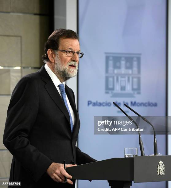 Spanish Prime Minister Mariano Rajoy gives a press conference after a cabinet meeting at La Moncloa Palace in Madrid, on October 27, 2017. Spanish...