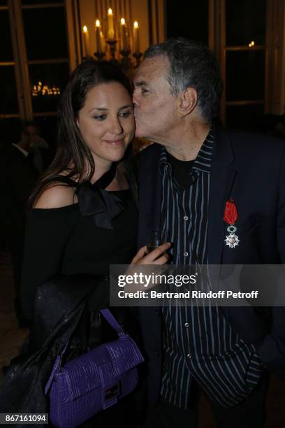 Honorary Israeli Filmmaker Amos Gitai poses with his daughter, Keren Mock at the Ministere de la Culture on October 27, 2017 in Paris, France.