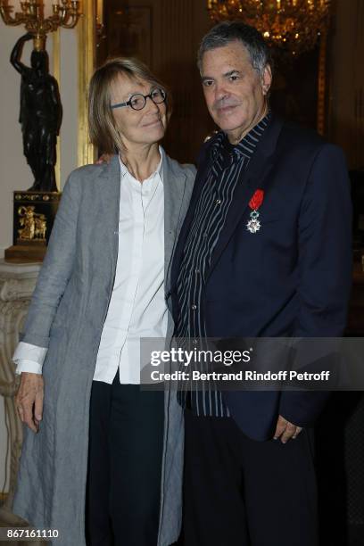 French Ministre of Culture Francoise Nyssen poses with Israeli Filmmaker Amos Gitai after awarding him with the Chevalier De L'Ordre National De La...