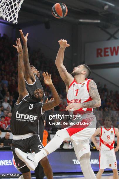 Vincent Poirier, #17 of Baskonia Vitoria Gasteiz competes with Dorell Wright, #3 of Brose Bamberg in action during the 2017/2018 Turkish Airlines...