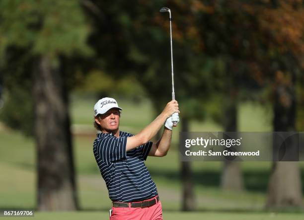 Derek Fathauer of the United States plays an approach shot on the second hole during the second round of the Sanderson Farms Championship at the...