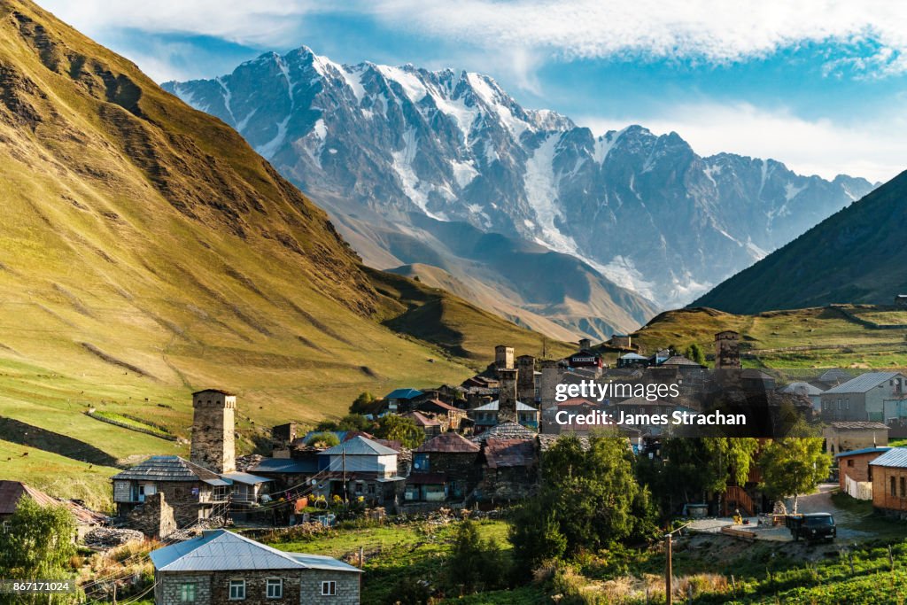 Fortified stone towers (koshi) of Ushguli Village with Mount Shkhara (5193m, Georgia's highest peak, Great Caucasus Range) in background, Upper Svaneti (UNESCO World Heritage Site), Georgia