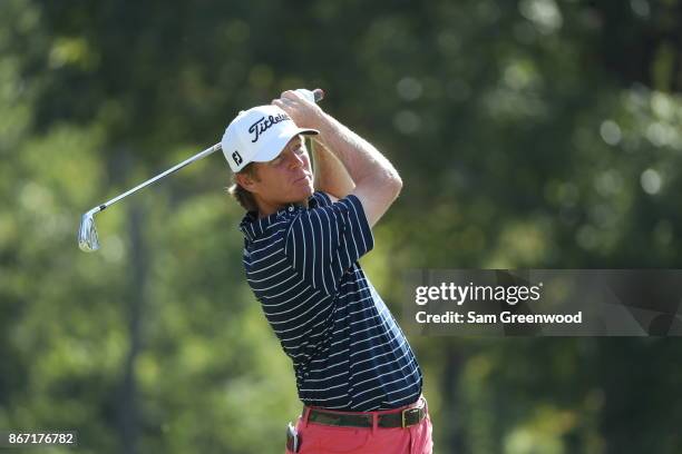 Derek Fathauer of the United States plays a tee shot on the fourth hole during the second round of the Sanderson Farms Championship at the Country...