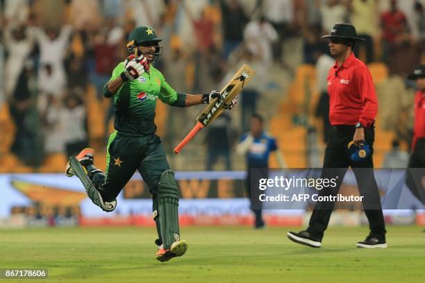 Pakistan's Hassan Ali celebrates match winning run between the wicket during the second Twenty20 series cricket match Pakistan vs Sri Lanka on...