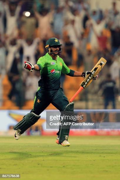 Pakistan's Hassan Ali celebrates match winning run between the wicket during the second Twenty20 series cricket match Pakistan vs Sri Lanka on...