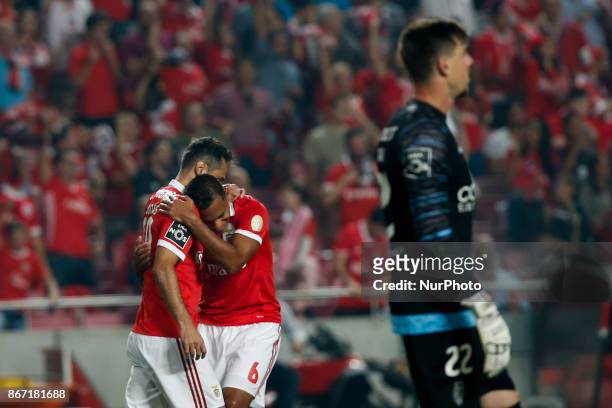 Benfica's forward Jonas celebrates his goal with Benfica's midfielder Filipe Augusto during Primeira Liga 2017/18 match between SL Benfica vs CD...