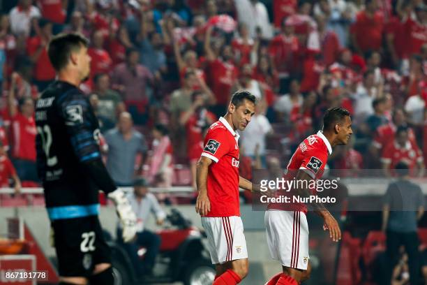 Benfica's forward Jonas celebrates his goal with Benfica's midfielder Filipe Augusto and Benfica's defender Andre Almeida during Primeira Liga...