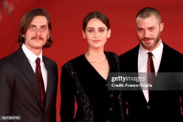 Luca Marinelli, Valentina Belle and Lorenzo Richelmy walks a red carpet for 'Una Questione Privata Red' during the 12th Rome Film Fest at Auditorium...