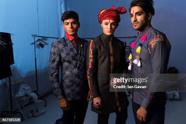 Models backstage ahead of the Varoin Marwah Menswear Presentation during Fashion Forward October 2017 held at the Dubai Design District on October...