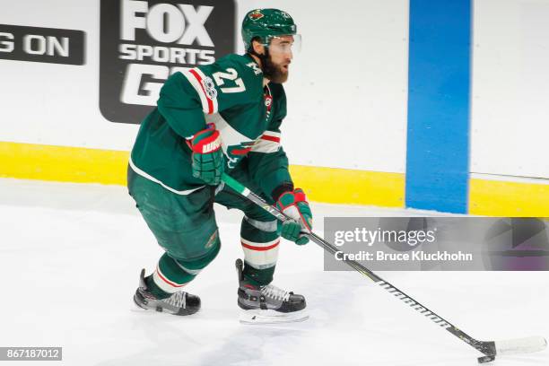 Kyle Quincey of the Minnesota Wild skates with the puck against the Vancouver Canucks during the game at the Xcel Energy Center on October 24, 2017...