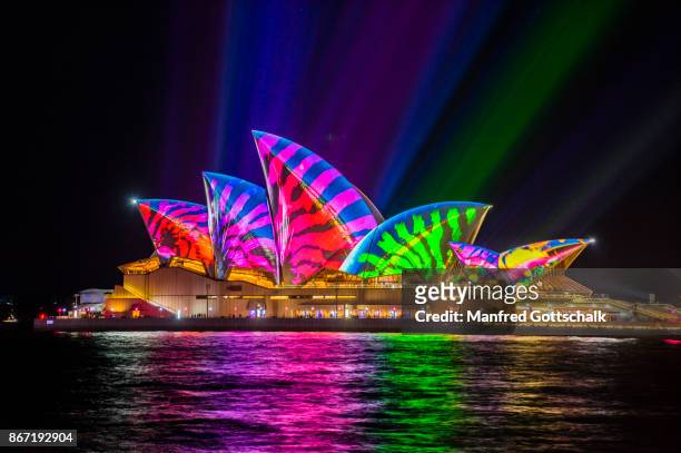 lighting of the sails vivid light 2017 - vivid sydney stock pictures, royalty-free photos & images