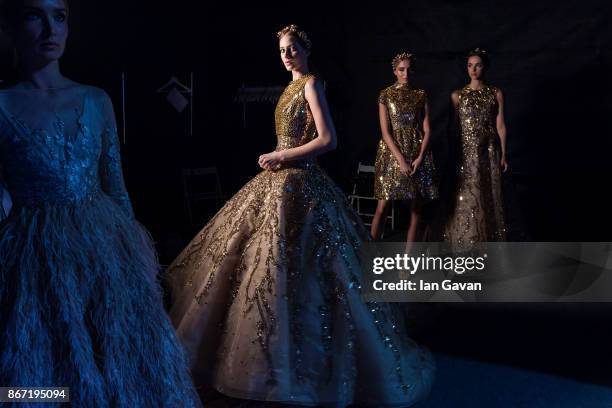 Models backstage ahead of the Atelier Zuhra show during Fashion Forward October 2017 held at the Dubai Design District on October 27, 2017 in Dubai,...