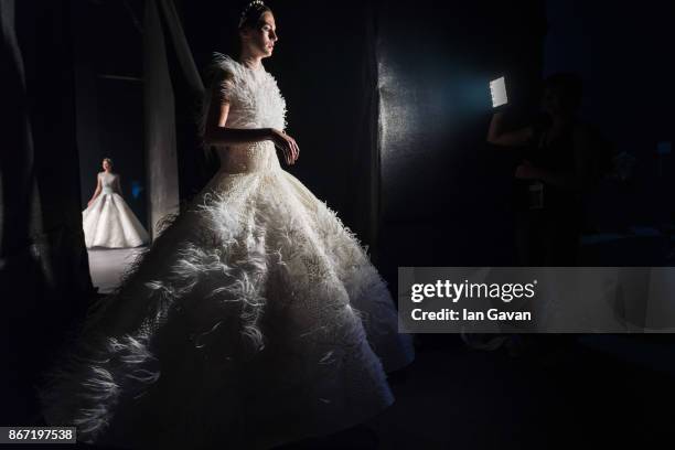 Model backstage ahead of the Atelier Zuhra show during Fashion Forward October 2017 held at the Dubai Design District on October 27, 2017 in Dubai,...