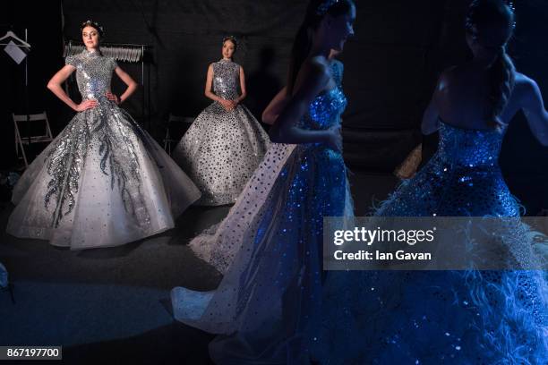 Models backstage ahead of the Atelier Zuhra show during Fashion Forward October 2017 held at the Dubai Design District on October 27, 2017 in Dubai,...