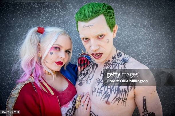 Cosplayers in character as Harley Quinn and The Joker from Suicide Squad during MCM London Comic Con 2017 held at the ExCel on October 27, 2017 in...