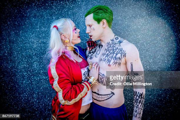 Cosplayers in character as Harley Quinn and The Joker from Suicide Squad during MCM London Comic Con 2017 held at the ExCel on October 27, 2017 in...