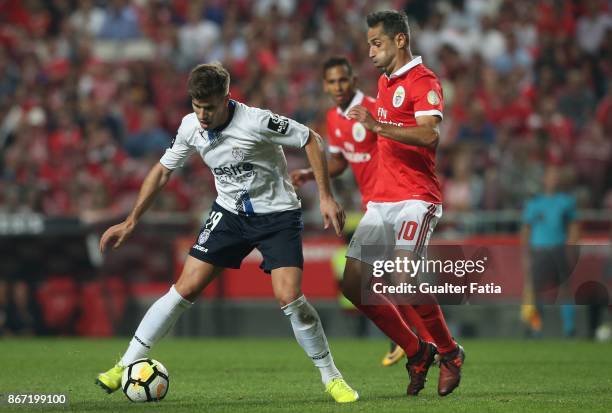 Feirense forward Joao Silva from Portugal with SL Benfica forward Jonas from Brazil in action during the Primeira Liga match between SL Benfica and...